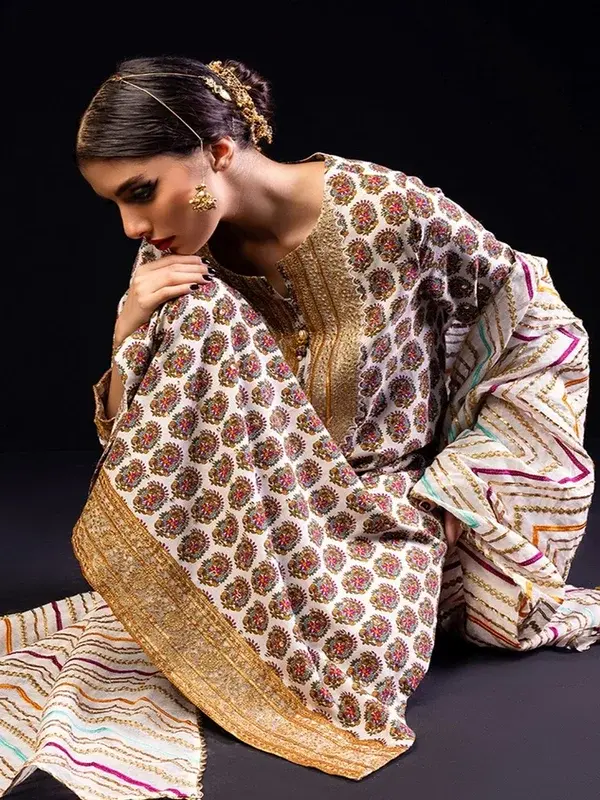 Khaadi winter unstitched shawl dresses with bold prints and elegant embroidery
