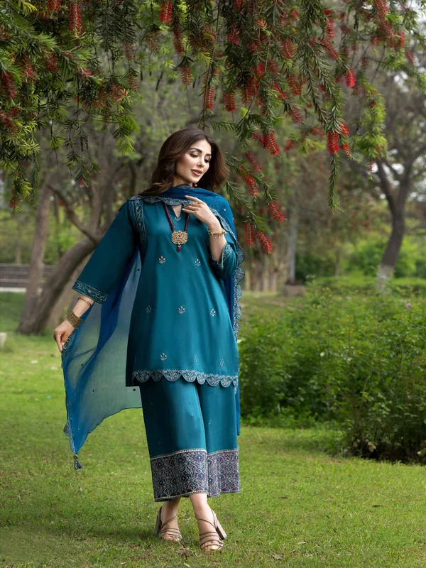 Nishat Linen digital print lawn fabrics from summer collection featuring vibrant and trendy designs